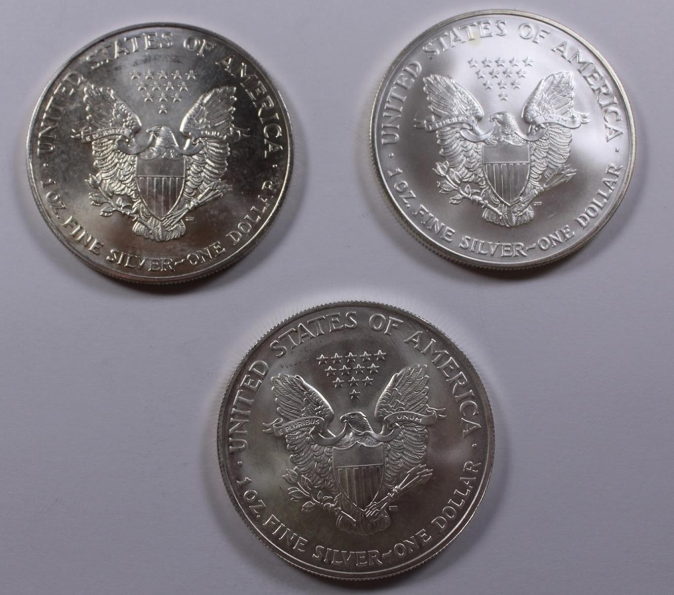 THREE AMERICAN SILVER EAGLES