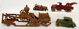 Group of four antique cast iron toy vehicles for parts or repairs