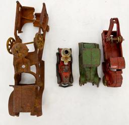 Group of four antique cast iron toy vehicles for parts or repairs