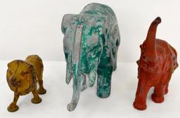 Vintage cast iron / aluminum elephants and lion one is a bank