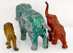 Vintage cast iron / aluminum elephants and lion one is a bank