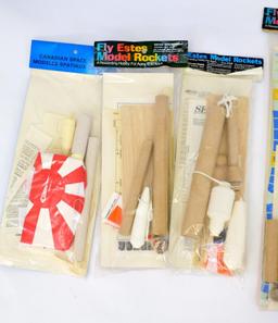 Six Mint Unbuilt Estes and Canaroc Rocket Kits sealed on header cards