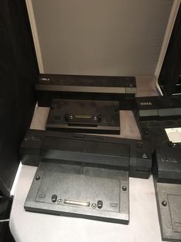 Four Dell Docking Stations With HP Docking Station