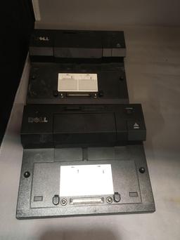 Four Dell Docking Stations With HP Docking Station