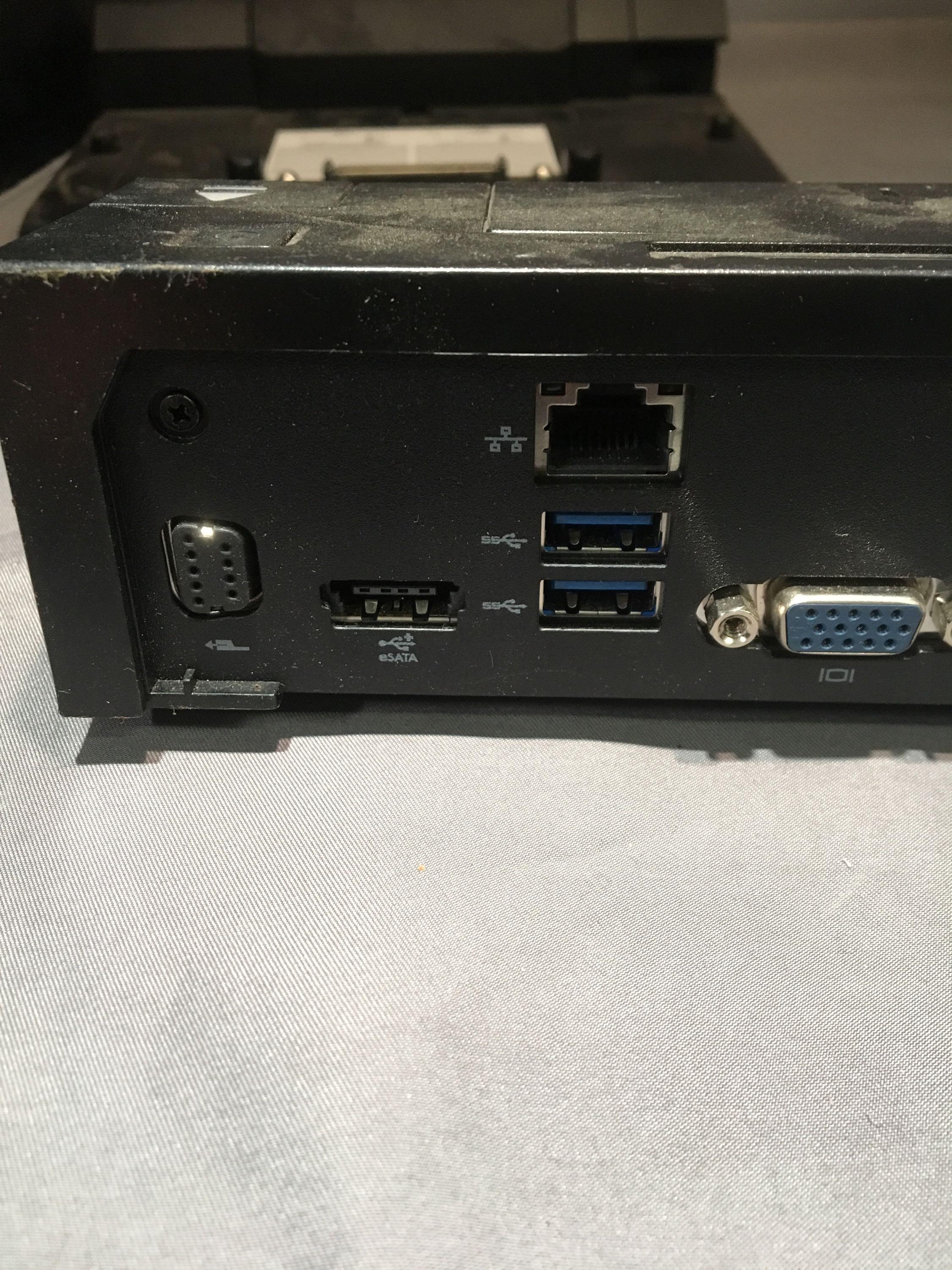 Four Dell Docking Stations With HP Docking Station