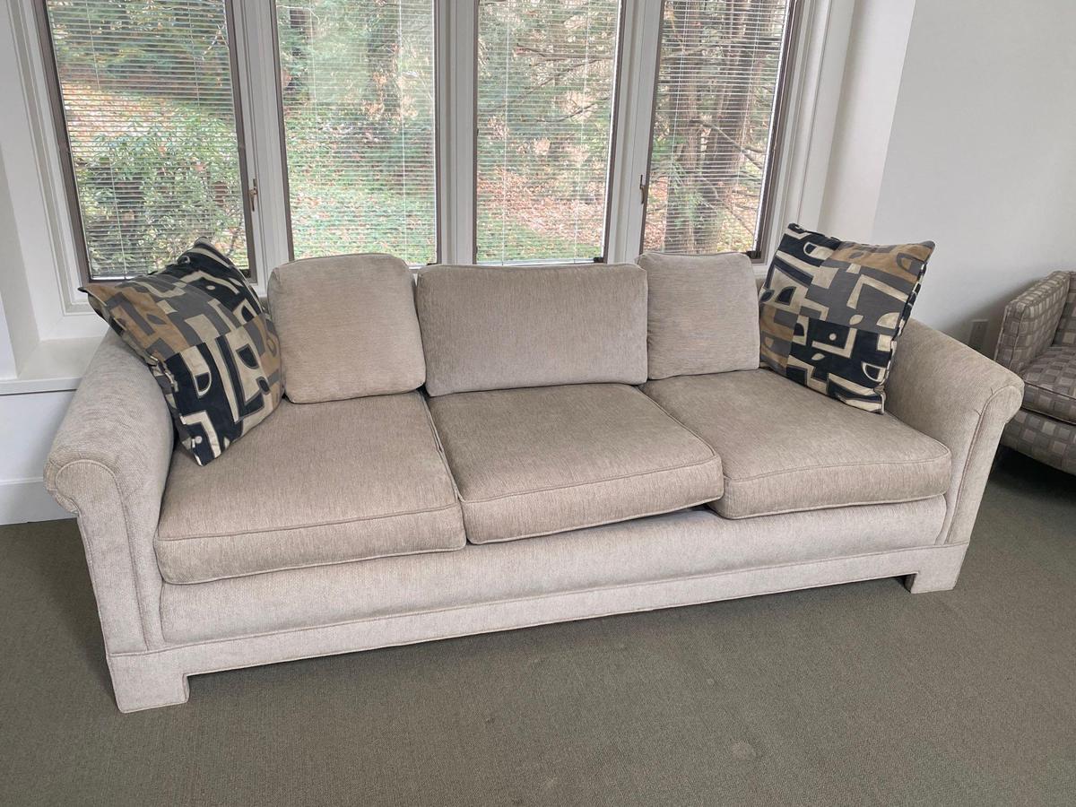 Cream Upholstered Sofa With Accent Pillows