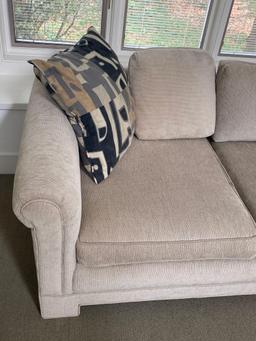 Cream Upholstered Sofa With Accent Pillows
