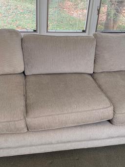 Cream Upholstered Sofa With Accent Pillows