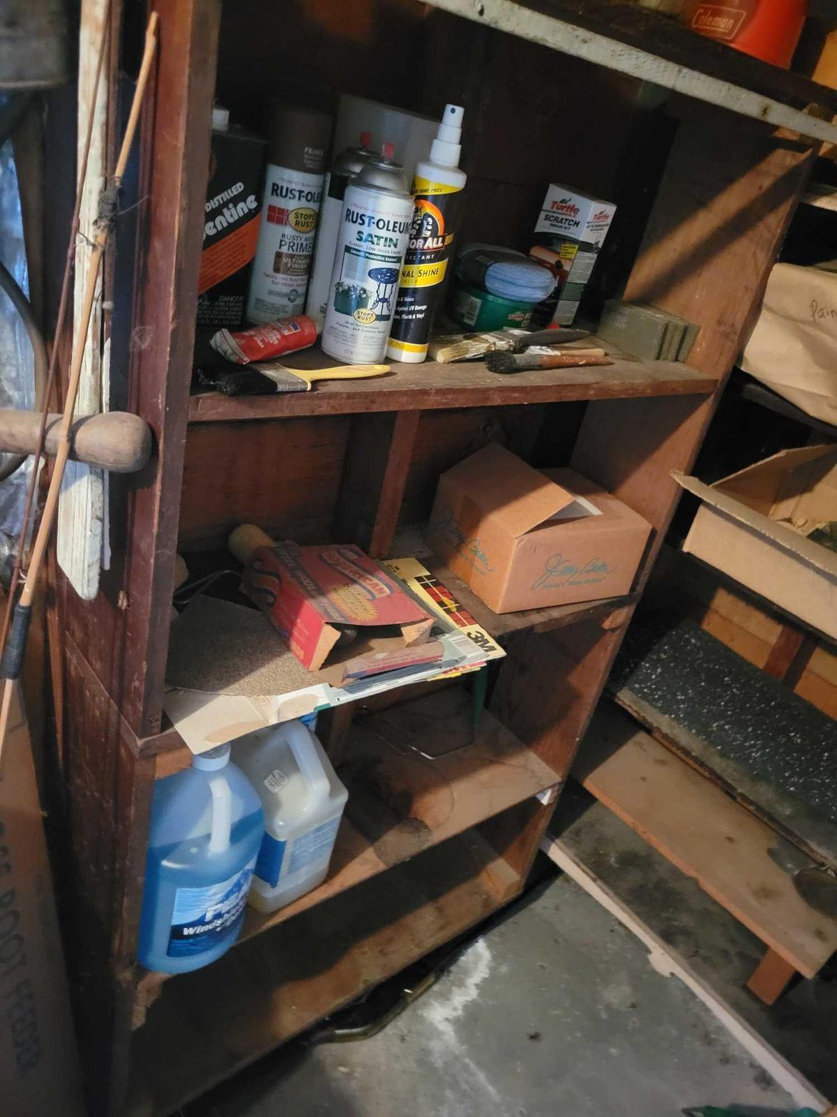 Garage Backroom Contents on Ground and Shelves on Right