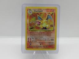 Base Set Charizard HOLO Pokemon card green wings charizard great for collection!!!