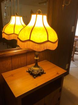 Heavy brass lamp with fringed shade