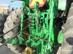 John Deere 7720 2wd 1899 hrs, 3 hyd, 20 speed power quad, 18.4-R42, weight rack, left hand reverser,