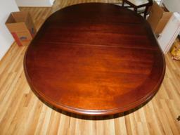 Kuolin Oval Dining Room Table with One Leaf