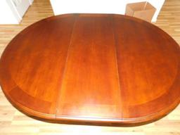 Kuolin Oval Dining Room Table with One Leaf