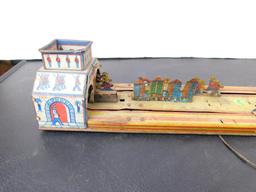 "THE BIG PARADE" TIN TOY