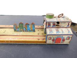 "THE BIG PARADE" TIN TOY