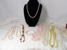 LOT OF FAUX PEARL AND BEADED NECKLACES IN VARIOUS SIZES AND LENGTHS