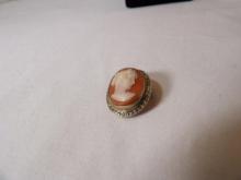 STERLING SHELL CAMEO PIN / PENDANT WITH MARCASITE HALO. APPROX 1"H, 3/4" WIDE. APPROX 4.3 GRAMS.