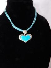 VINTAGE LEATHER CORD WITH STERLING TURQUOISE HEART PENDANT.