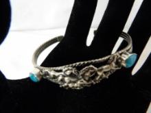 STERLING CUFF BRACELET WITH RUNNING HORSES. NATIVE AMERICAN TURQUOISE ACCENTS. APPROX 12.5 GRAMS