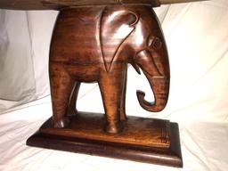 Unique carved Mahogany Elephant based table.