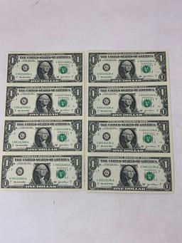 Two uncut sheets of 2003 US $1 Bills