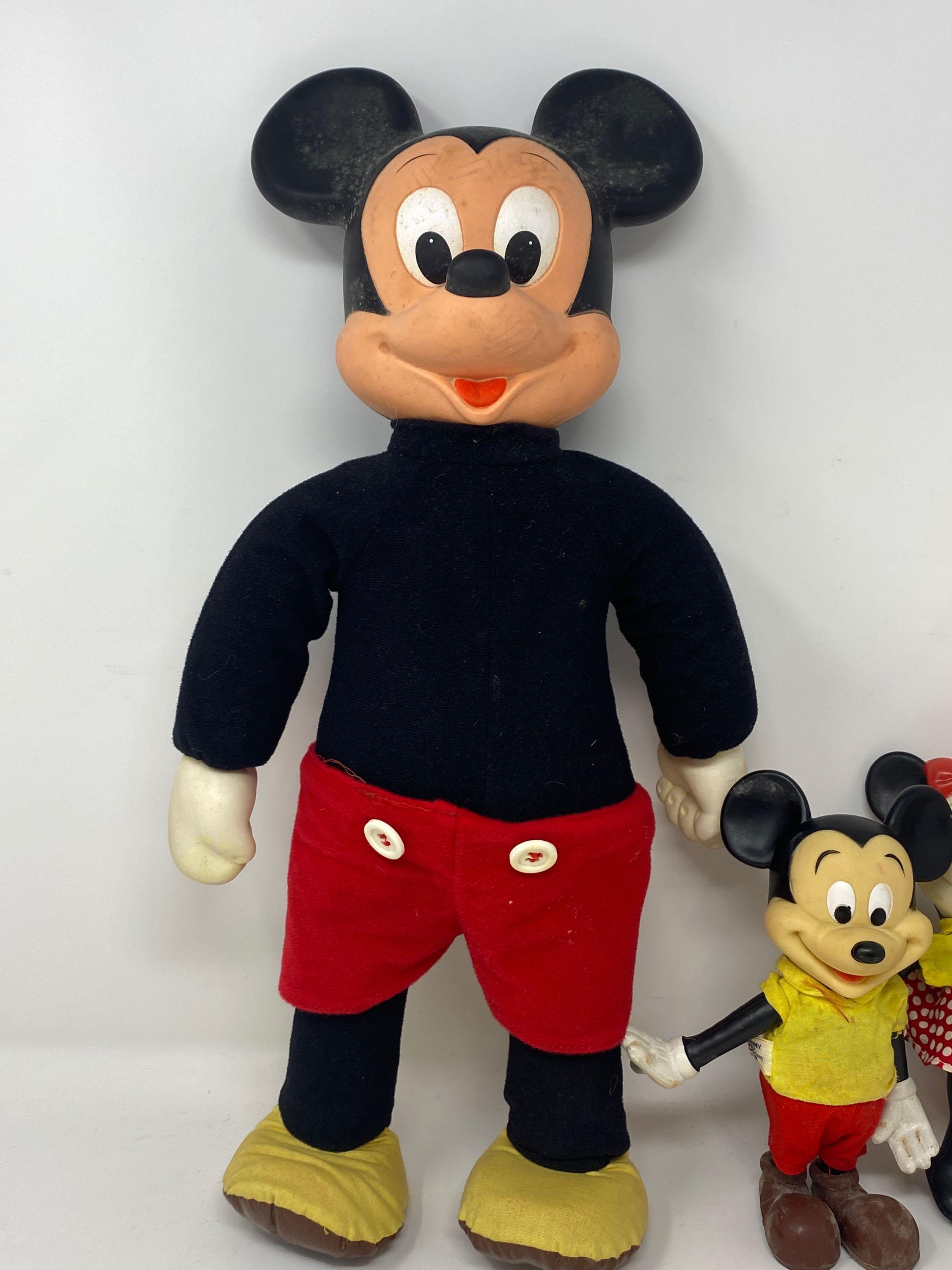 3 Mickey Mouse and One Minnie Mouse Plush Dolls