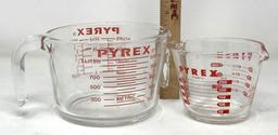 2 Pyrex Measuring Cups