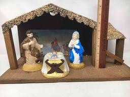 Nativity Set with Stable and Red Tree Skirt