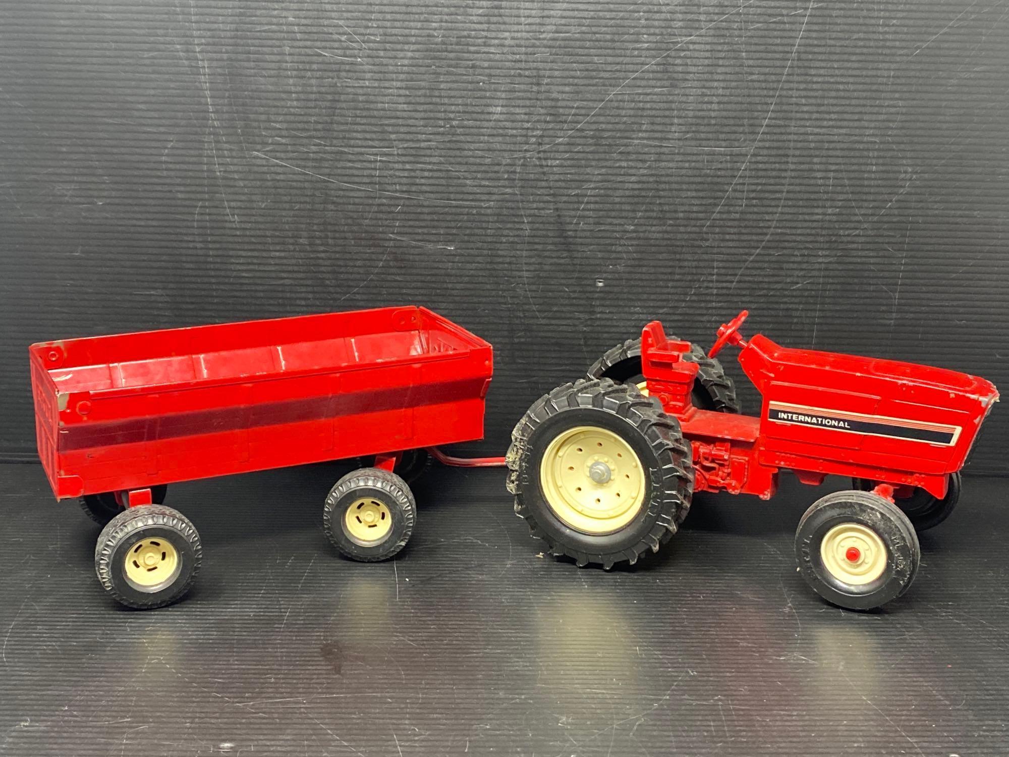 Vintage Die Cast International Tractor with 2 Wagons and Other Smaller Wagon