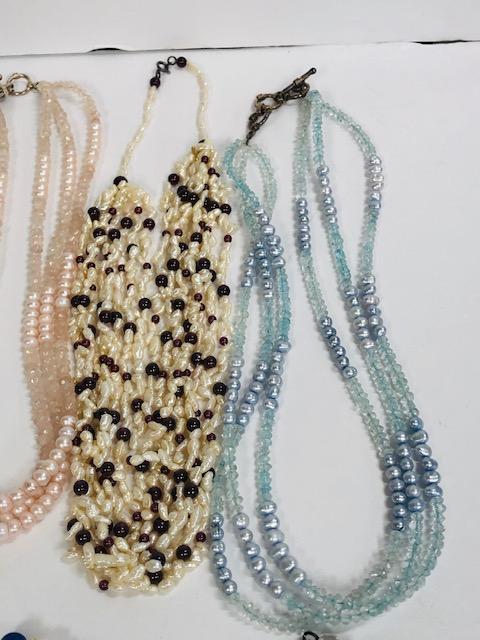 12 Pearl Necklaces
