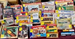 LOT OF TOY TRAINS, TRACKS AND MOTORS