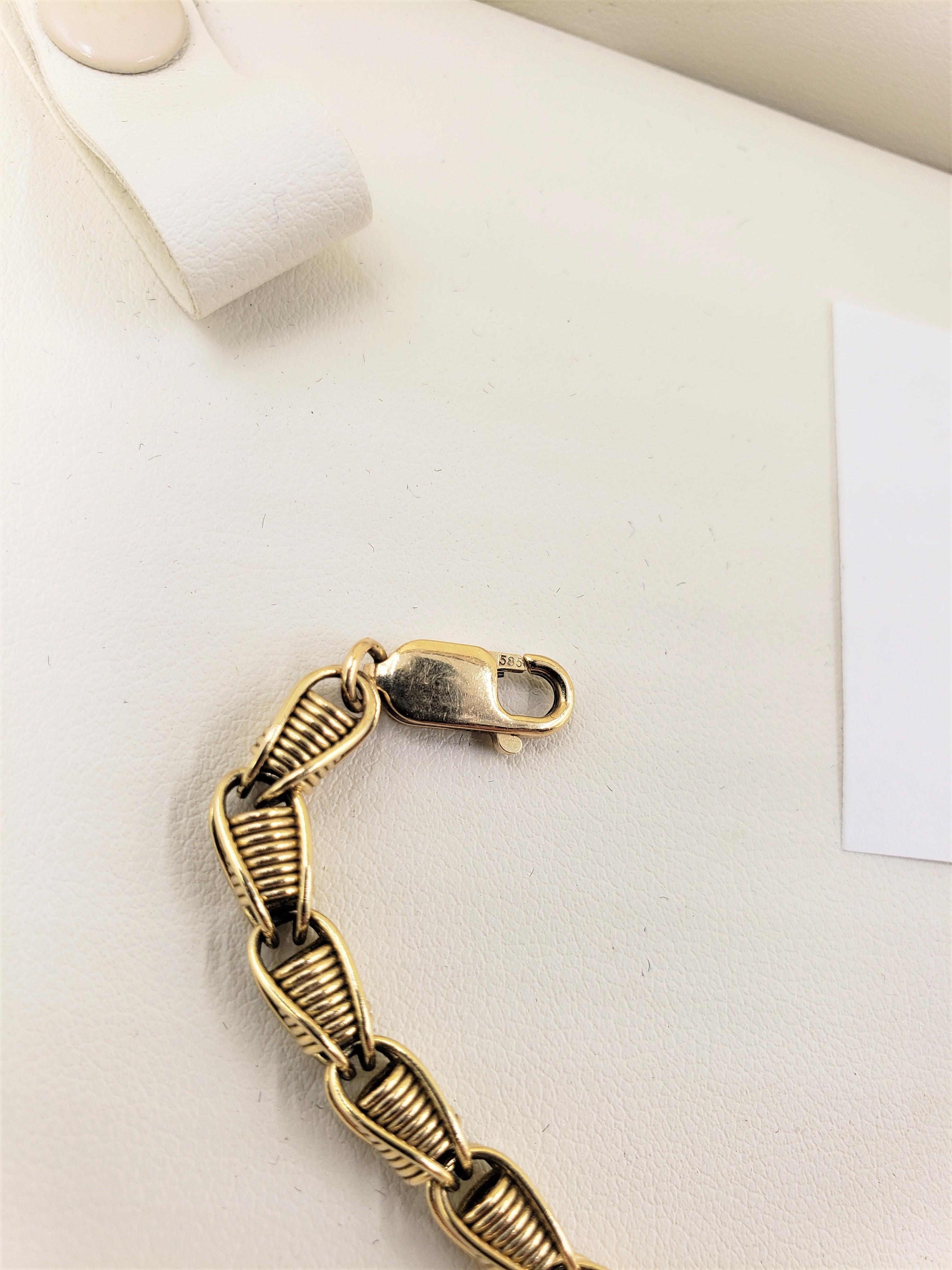 14KT GOLD BRACELET 8" IN LENGTH 14.3 GRAMS OF GOLD