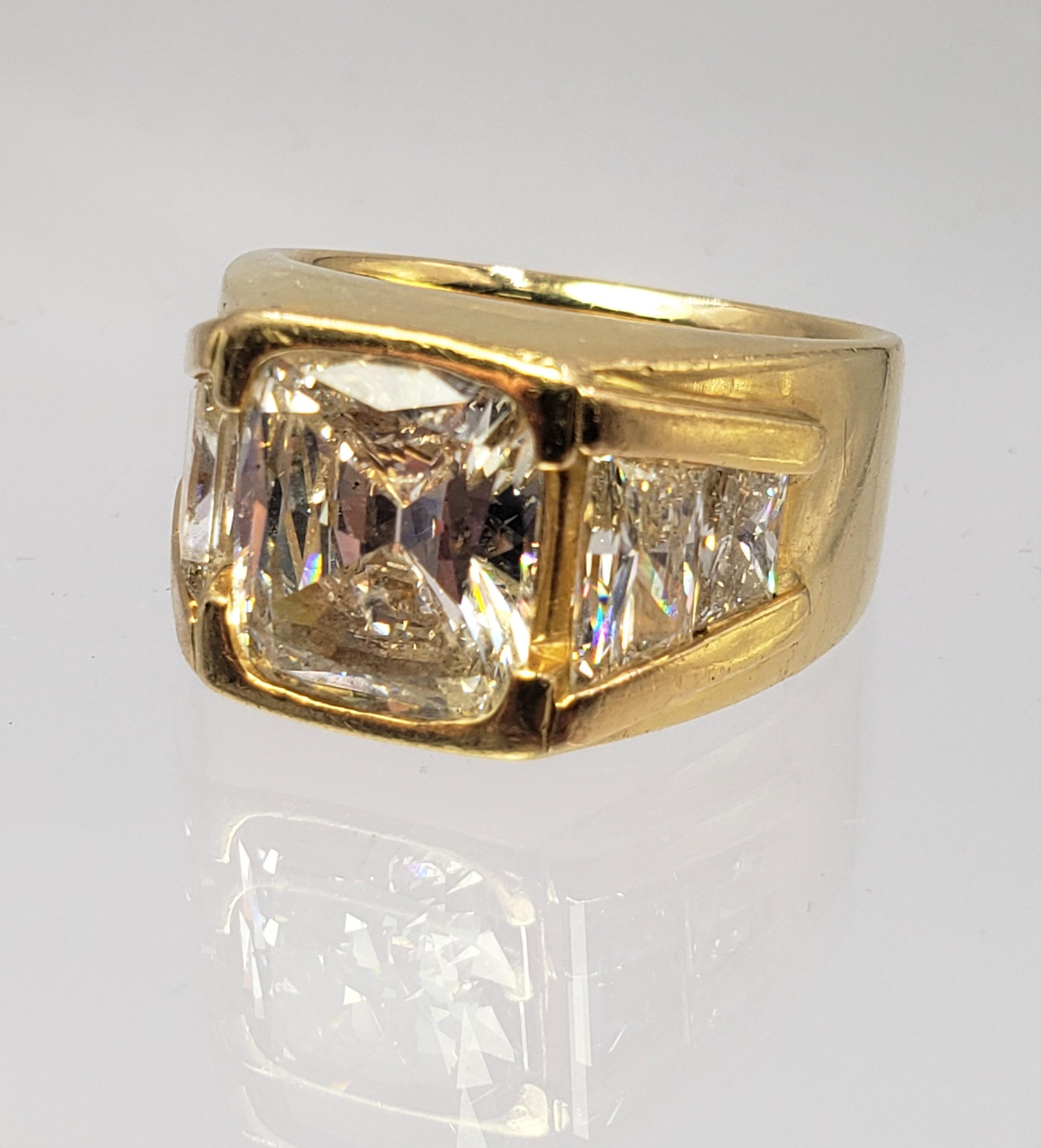 18KT YELLOW GOLD 5.06CT GIA CERTIFIED DIAMOND RING WITH TRAPEZOID CUT SIDE DIAMOND SETTING