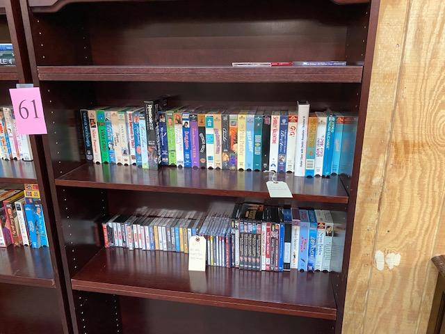 PAIR OF WOOD BOOKSHELVES WITH DVDS, VHS TAPES AND CDS