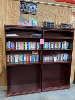 PAIR OF WOOD BOOKSHELVES WITH DVDS, VHS TAPES AND CDS