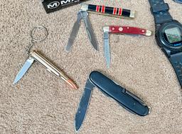 LARGE LOT OF HUNTING KNIVES, SHARPENING SYSTEM, POCKET KNIVES AND WATCHES