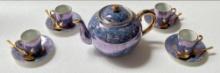 HUES 'N BREWS TEA SET BY HERMAN DODGE AND SONS