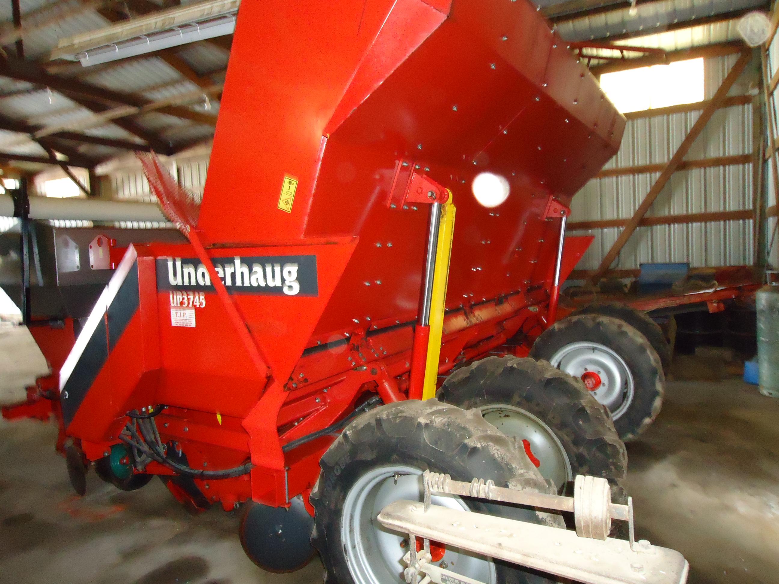 2009 Underhaug 4 row UP 3745 potato planter, dry fert, liquid chem, hyd. Lo