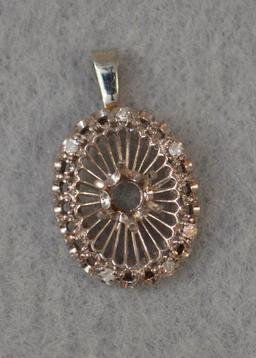 14k White Gold Pendant W/ (22) Prong Mountings. (6) Small Diamonds Remaining, Others Have Been