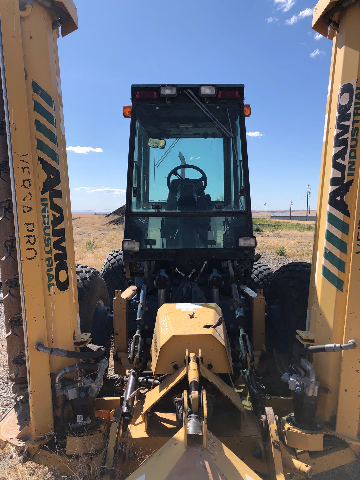 New Holland 9030 Versatile Bidirectional Tractor (ENGINE FIRE), Loader, & Wing Up Flail Mower