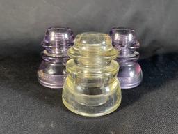 Pair of Uranium electrical Insulators & (1) clear insulator