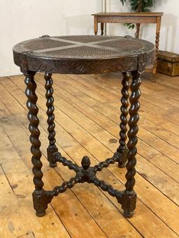 Carved Oak Parlor Table w/ Barley Twist Legs & 4-section caned top.