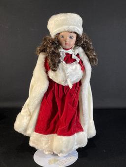 16" Porcelain doll in a red & white velvet clothing w/ stand