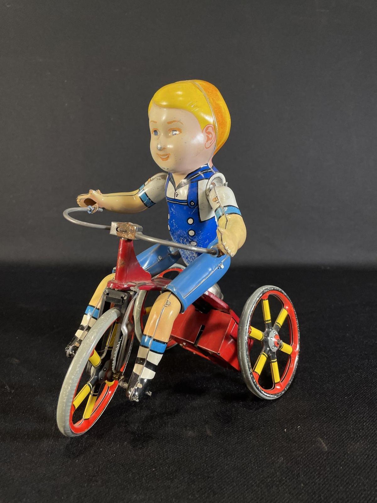 The Unique Art Mfg. Co.Wind Up Kiddie Cyclist