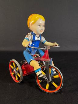 The Unique Art Mfg. Co.Wind Up Kiddie Cyclist