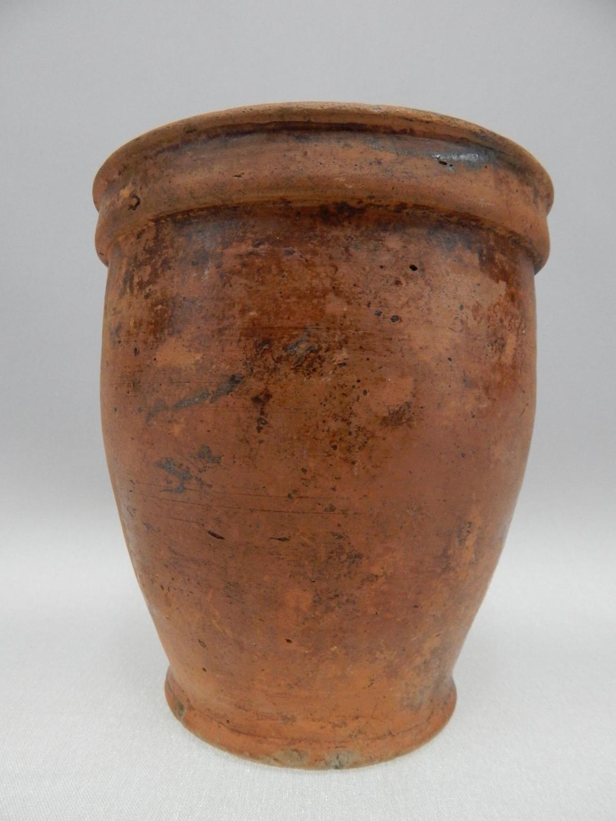 REDWARE CROCK 6 1/2" T & 6" DIAMETER (CHIP & 2" HAIRLINE ON RIM, ALSO 2 HAIRLINES AT BASE)