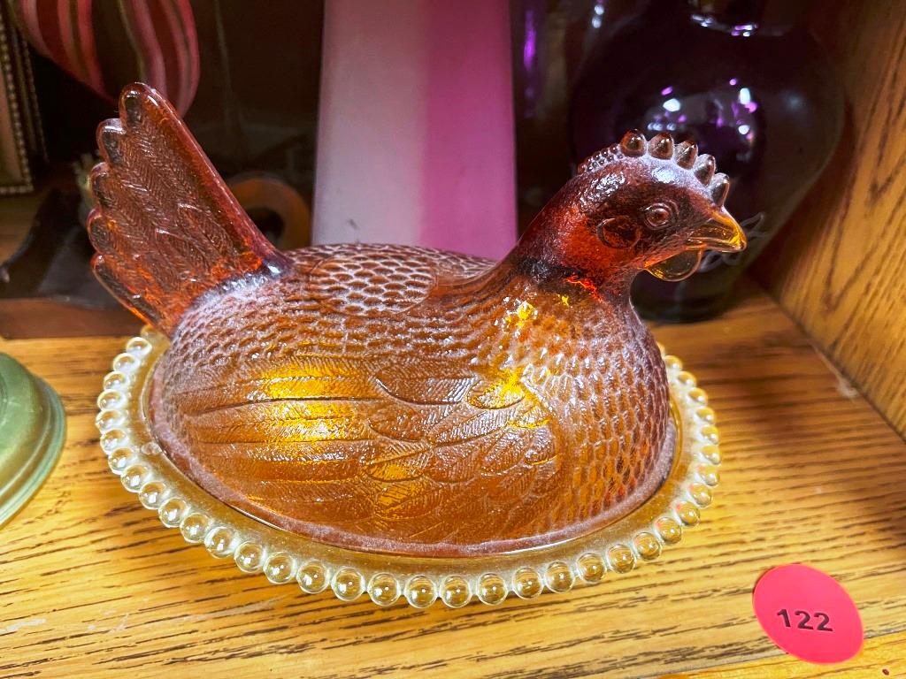 Hen on a nest and candle grouping