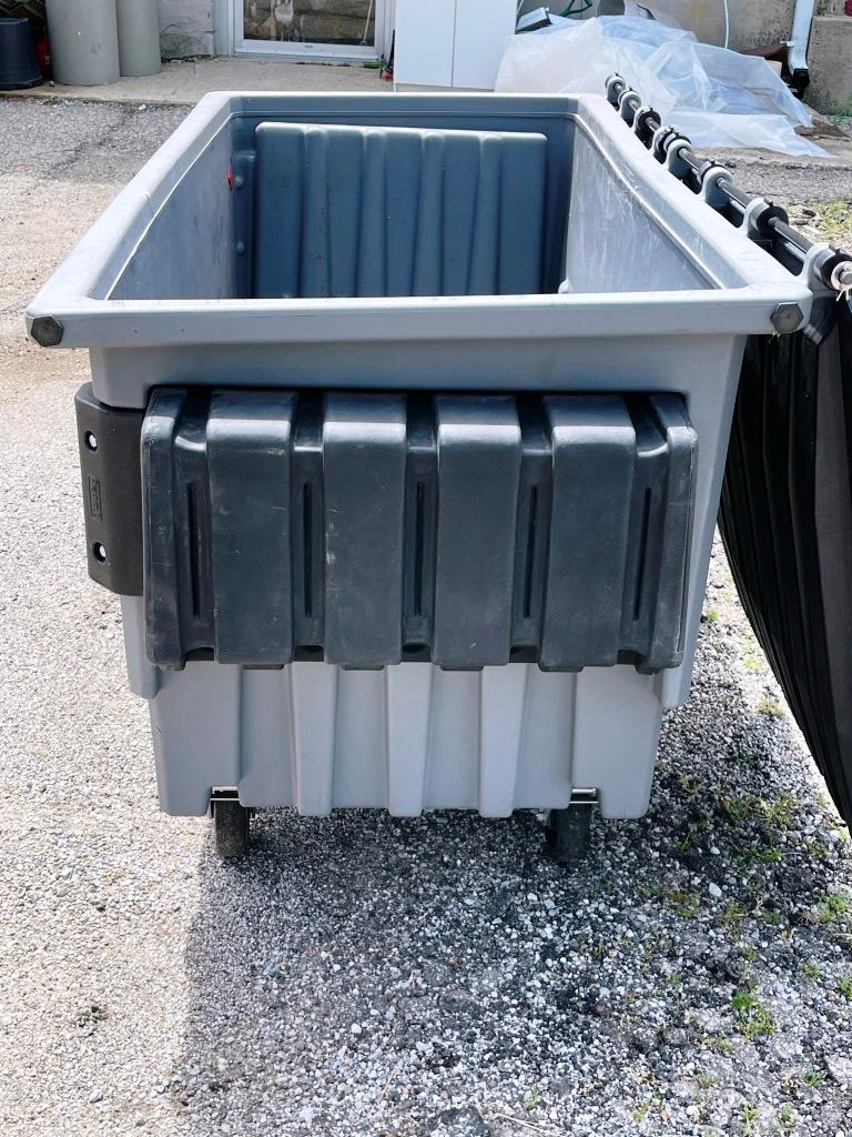 Garbage Dumpster and plastic sheeting