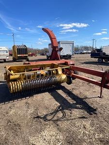 New Holland 790 chopper with hay head and corn head